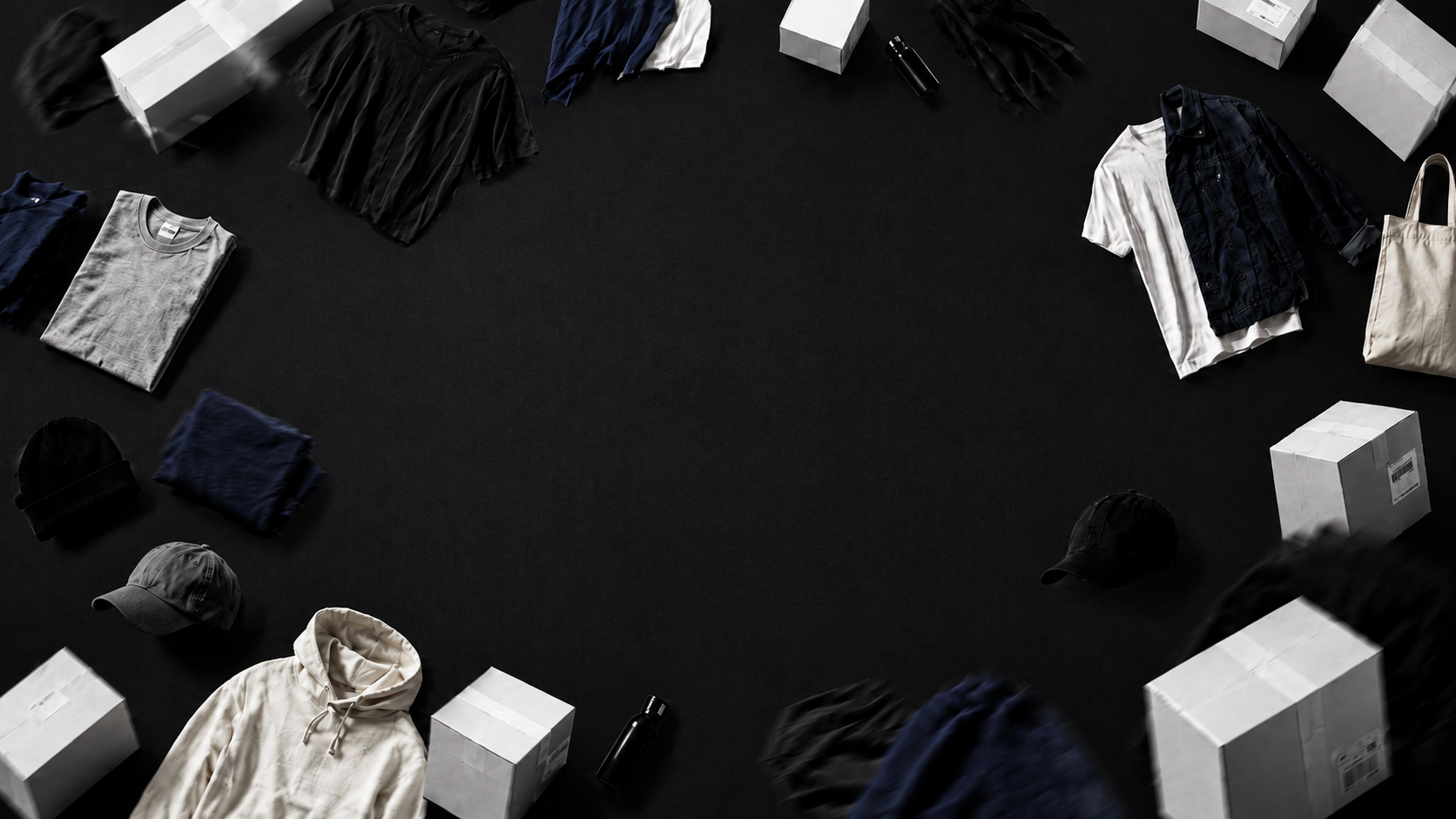 Creator Supply merch flatlay with apparel, packaging and accessories arranged on a dark surface